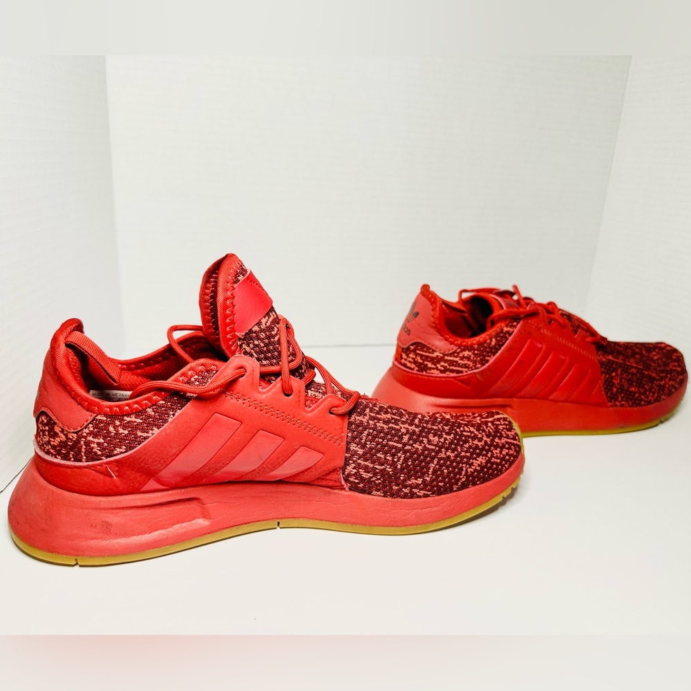 Red adidas runner/trainers sizeiners size 8.5 women’s. Very lightly used.